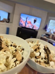 Two bowls of Spooky S’mores popcorn with marshmallows, graham crackers and chocolate chips for The Addams Family 2.