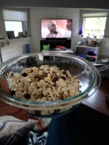 Kooky Crunch popcorn with dark chocolate chips and Halloween sprinkles during Addams Family Values.